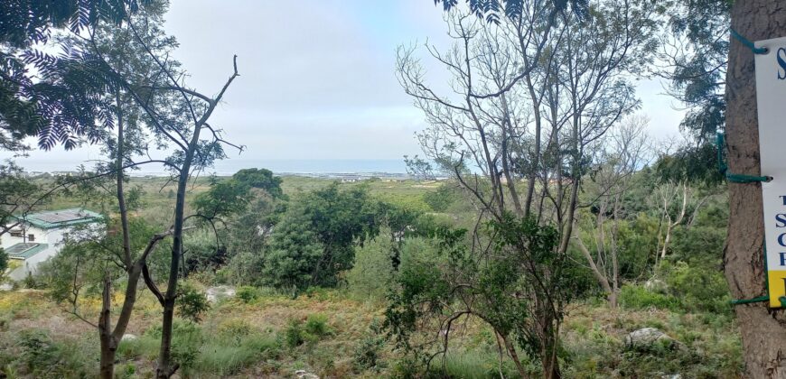 Large elevated sloped plot with terrific sea views over expansive  greenbelt to front