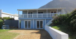 The Rustic Beach House —– ” Second row seats….. one plot back from the beach”