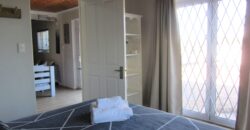 The Rustic Beach House —– ” Second row seats….. one plot back from the beach”