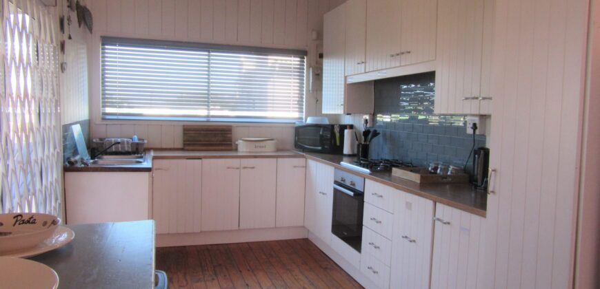 The Rustic Beach House —– ” Second row seats….. one plot back from the beach”