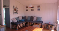 The Rustic Beach House —– ” Second row seats….. one plot back from the beach”