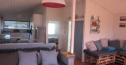 The Rustic Beach House —– ” Second row seats….. one plot back from the beach”